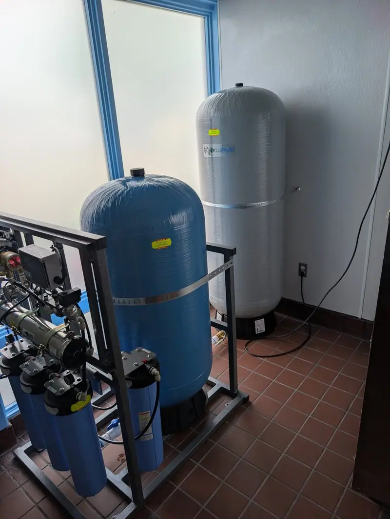 Pressure tanks and water treatment system installed by Liquid Solutions Inc
