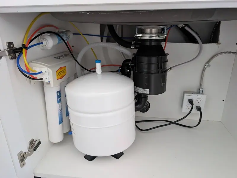 Under-sink reverse osmosis system installed by Liquid Solutions Inc