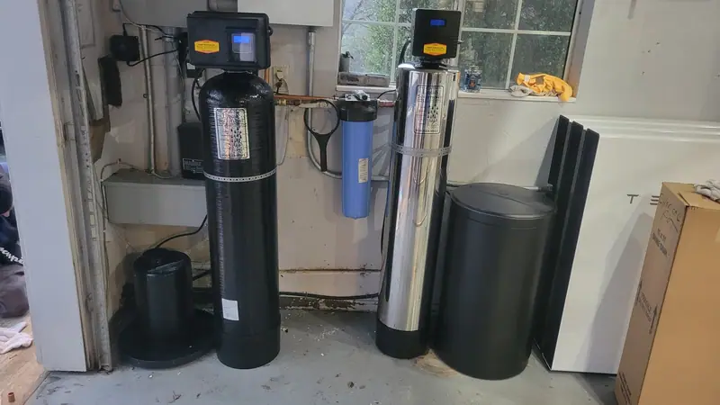 Water treatment system with filter tanks installed by Liquid Solutions Inc