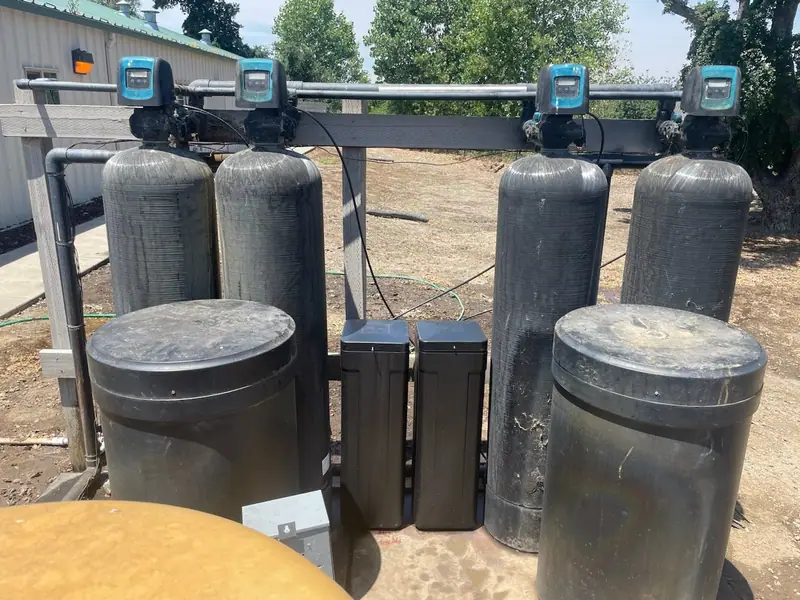 Multi-tank water treatment system installed by Liquid Solutions Inc