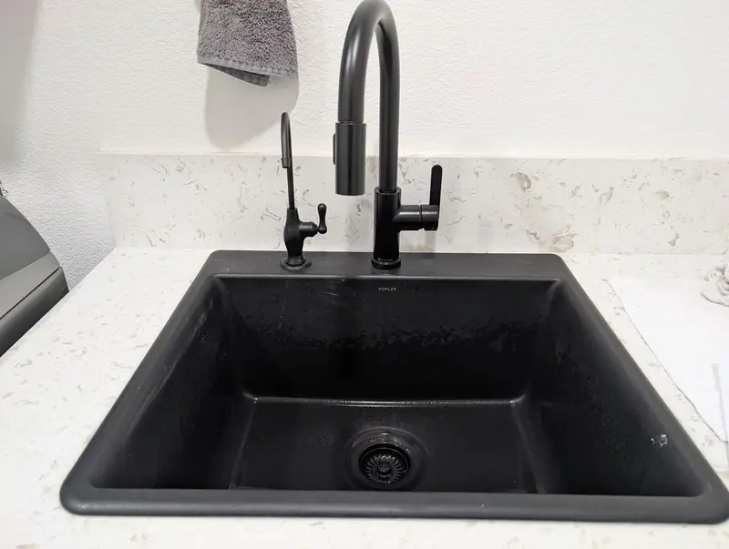 Matte black reverse osmosis drinking-water faucet installed by Liquid Solutions Inc